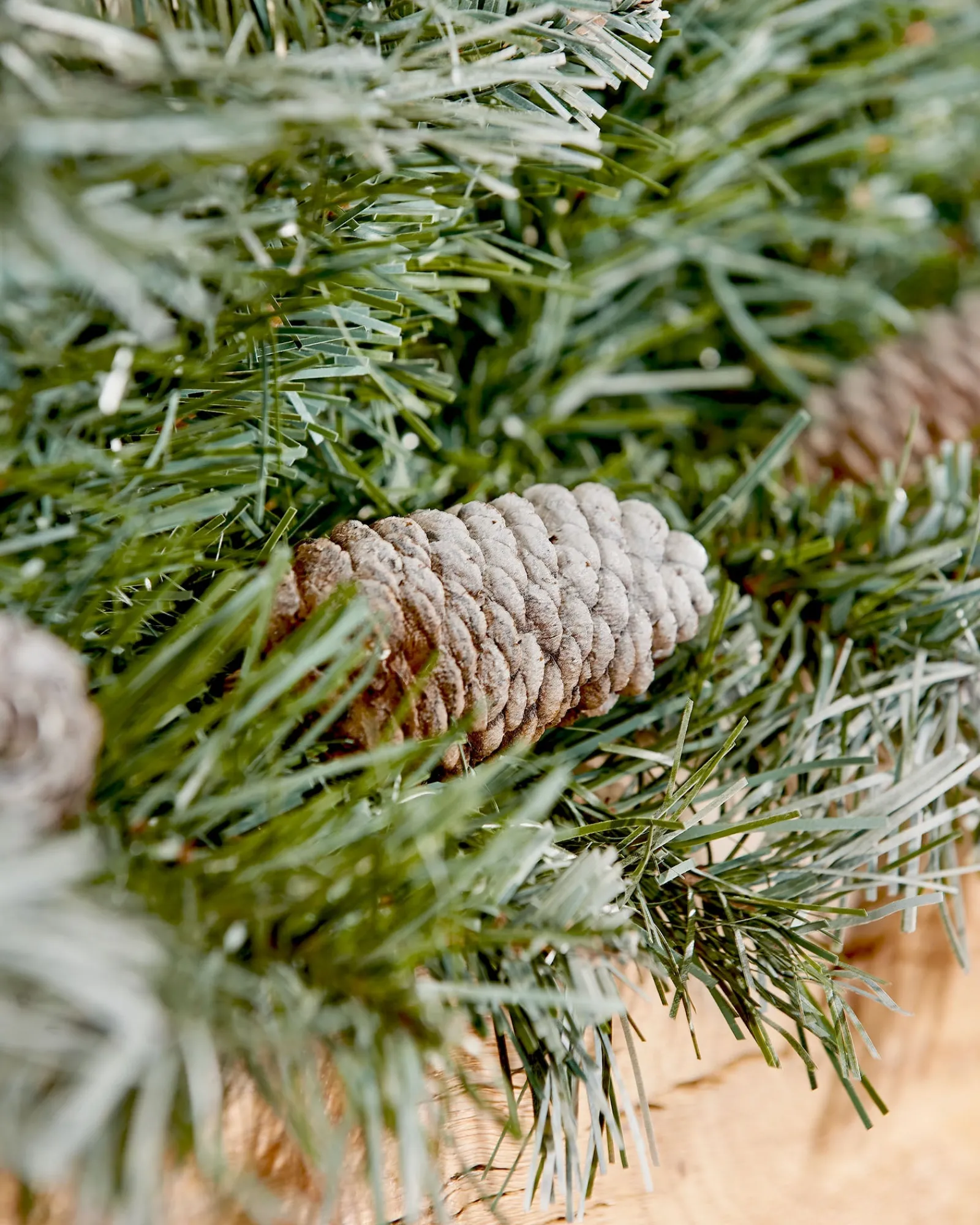 WeRChristmas Pre-Decorated Frosted Scandinavian Blue Spruce Garland, 9 Ft