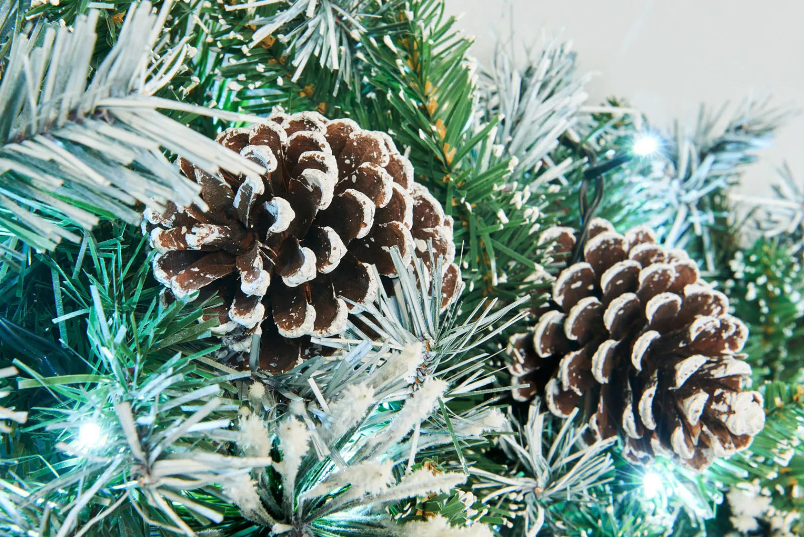 WeRChristmas Pre-Lit Decorated Snow Flocked Garland, Pinecones, 9 Ft