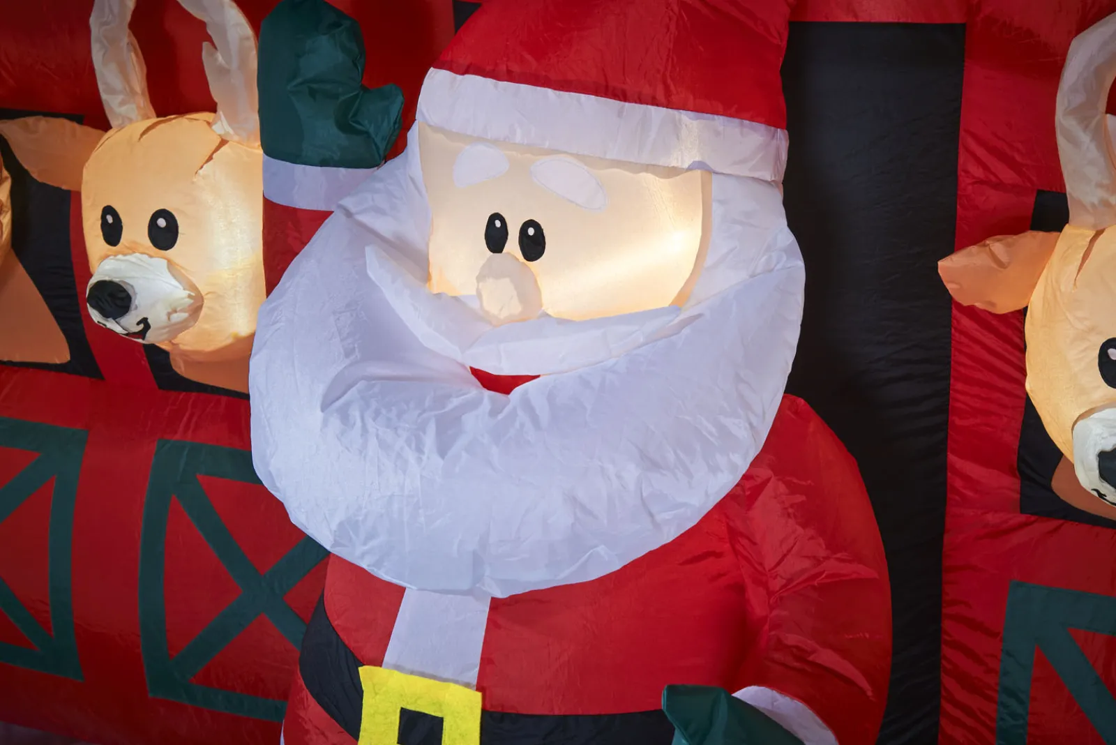 WeRChristmas Pre-Lit Inflatable Santa & Reindeer Stables, 8.5 Ft