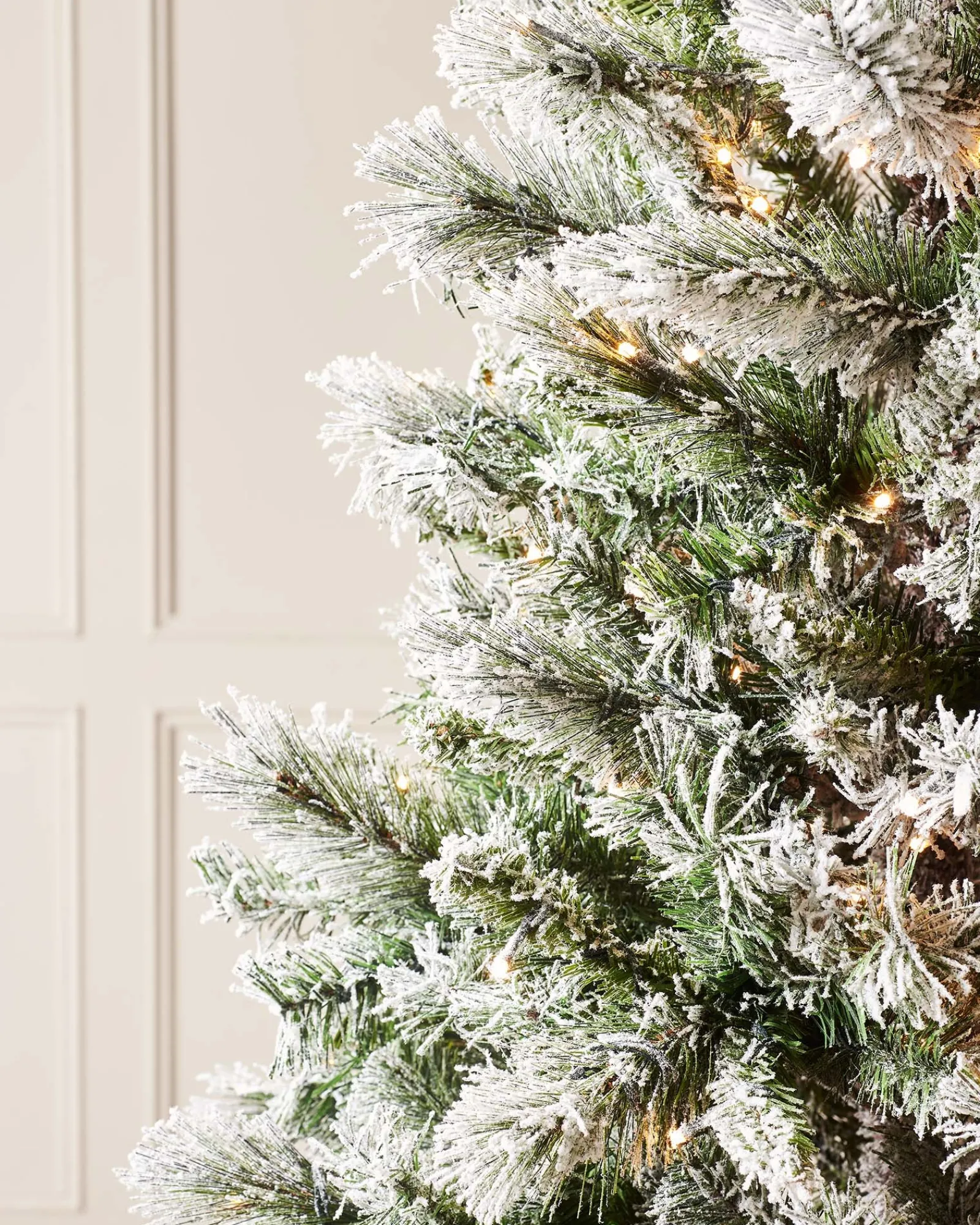 WeRChristmas Pre-Lit Slim Snow Flocked Spruce Christmas Tree, 9 Ft