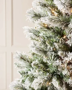 WeRChristmas Pre-Lit Slim Snow Flocked Spruce Christmas Tree, 10 Ft