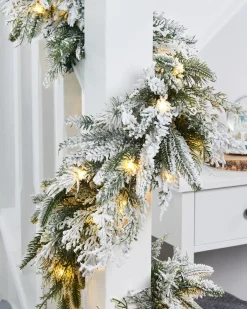 WeRChristmas Pre-Lit Snow Flocked Natural Fir Garland, 18 Ft