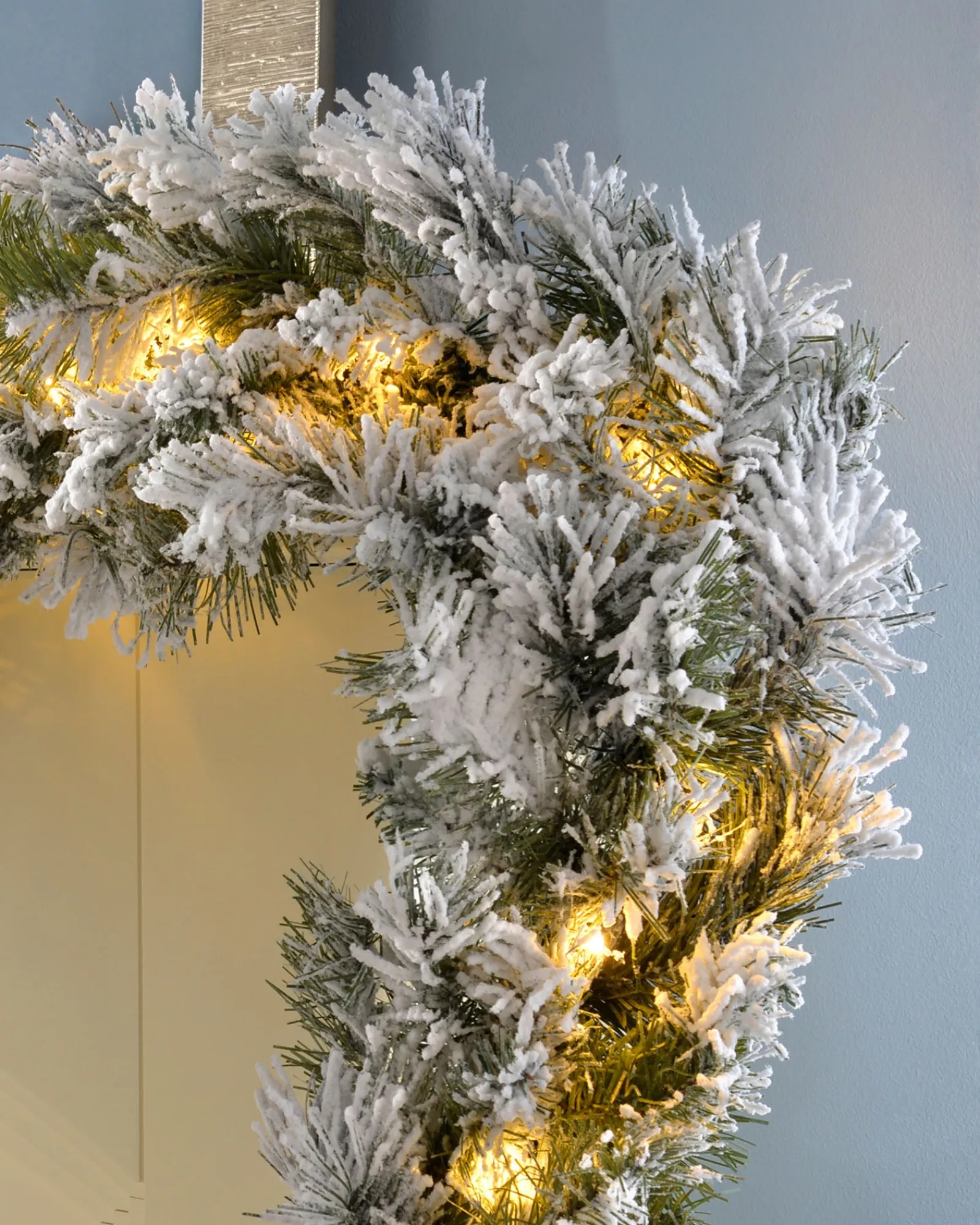 WeRChristmas Pre-Lit Snow Flocked Spruce Garland, 9 Ft